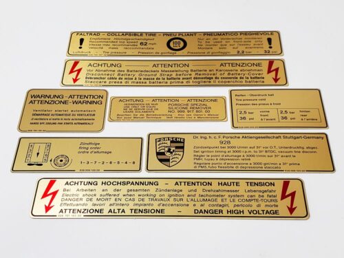 78 porsche 928 row euro gold metal foil sticker decal 92870116302 high voltage 92800610500 firing order 92800610300 emissions control 92800610300 ignition timing 92870115102 fan warning 9287015302 intensive washer 92800650500 tire pressure 92800650500 9287015502 battery cover 92870115702 spare tire pressure